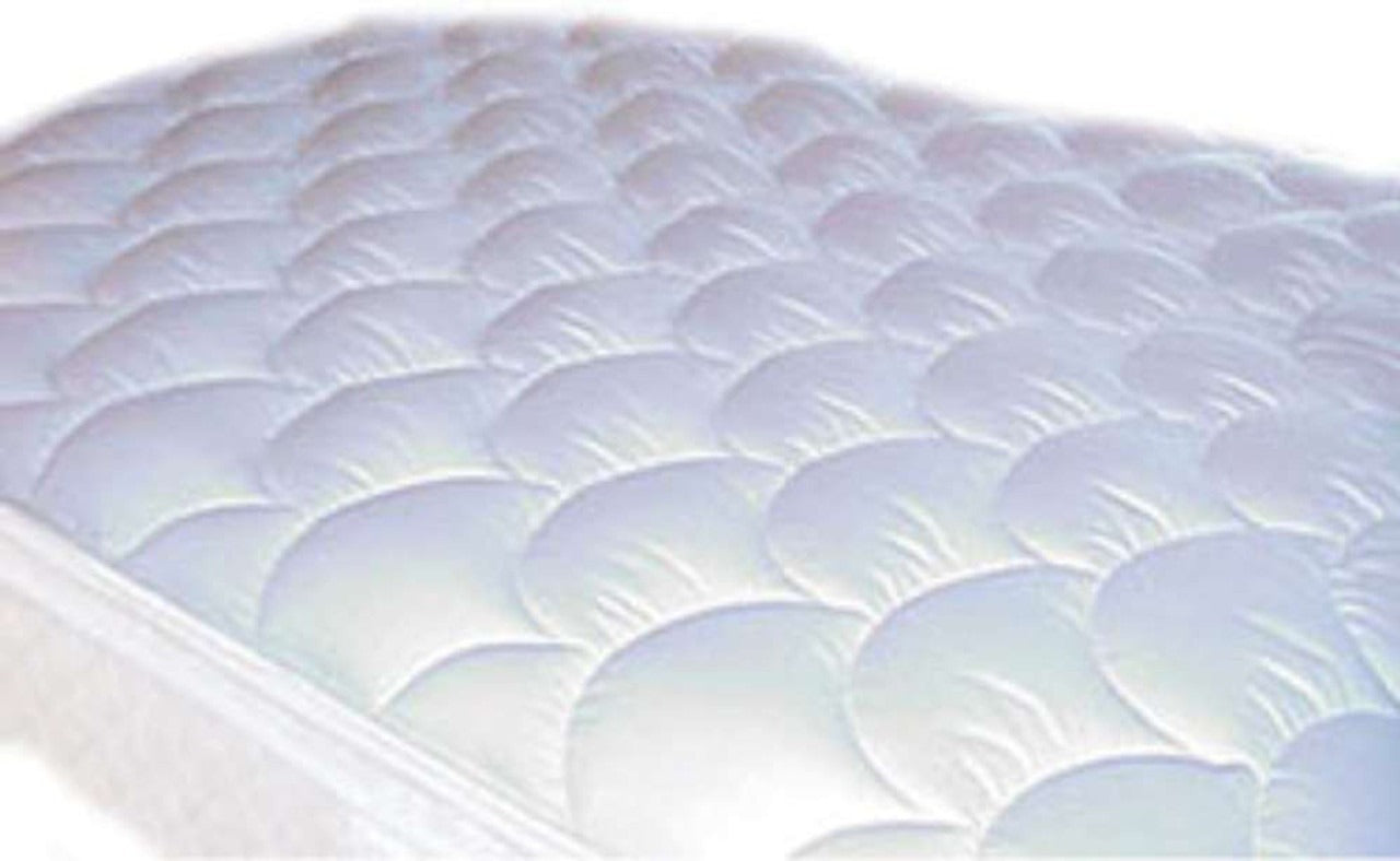A close-up of the Ganesh Mills Oxford Stay Secure Three Layer Waterproof Fitted Mattress Pad, showcasing its white, quilted design with a scalloped, cushioned pattern and a 2 anchor band for a secure fit.