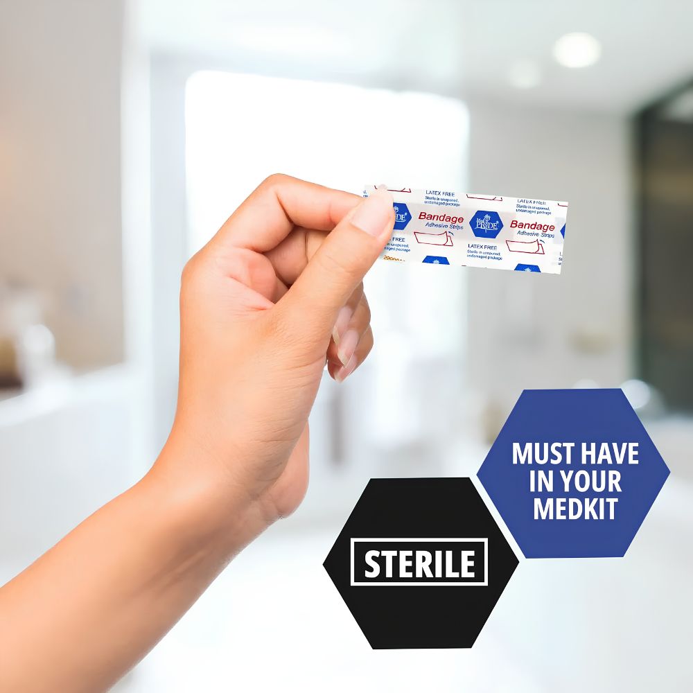 A hand holds a Shield Line MedPride Sheer Strip Adhesive Bandage pack (3/4"x3" & 1"x3") in a bright, blurred indoor setting. Graphic text reads STERILE and MUST HAVE IN YOUR MEDKIT, highlighting hypoallergenic wound protection.