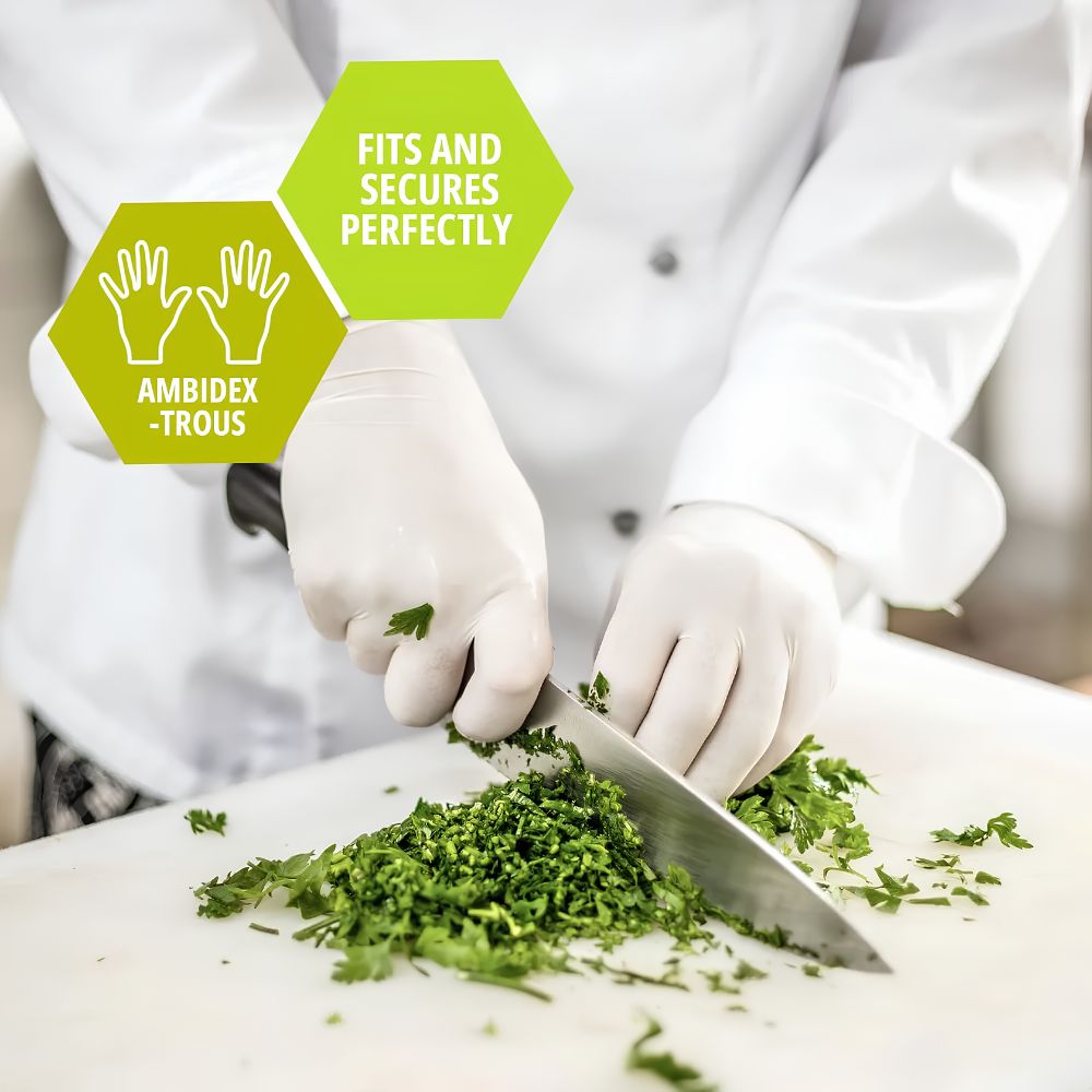 A person in a white chef’s coat chops leafy herbs while wearing Shield Line MedPride Latex Exam Gloves—5 mil thick, non-sterile, powder-free. Graphics read “Ambidextrous” and “Fits and secures perfectly.”.