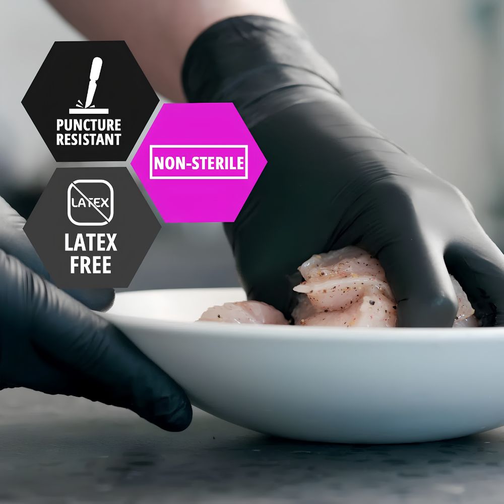 A person wearing Shield Line MedPride Black Nitrile Exam Gloves (Powder Free, Non Sterile, 4 Mil Thick) handles raw chicken in a white bowl. Three hexagonal labels read: Puncture Resistant, Latex Free, and Non-Sterile.