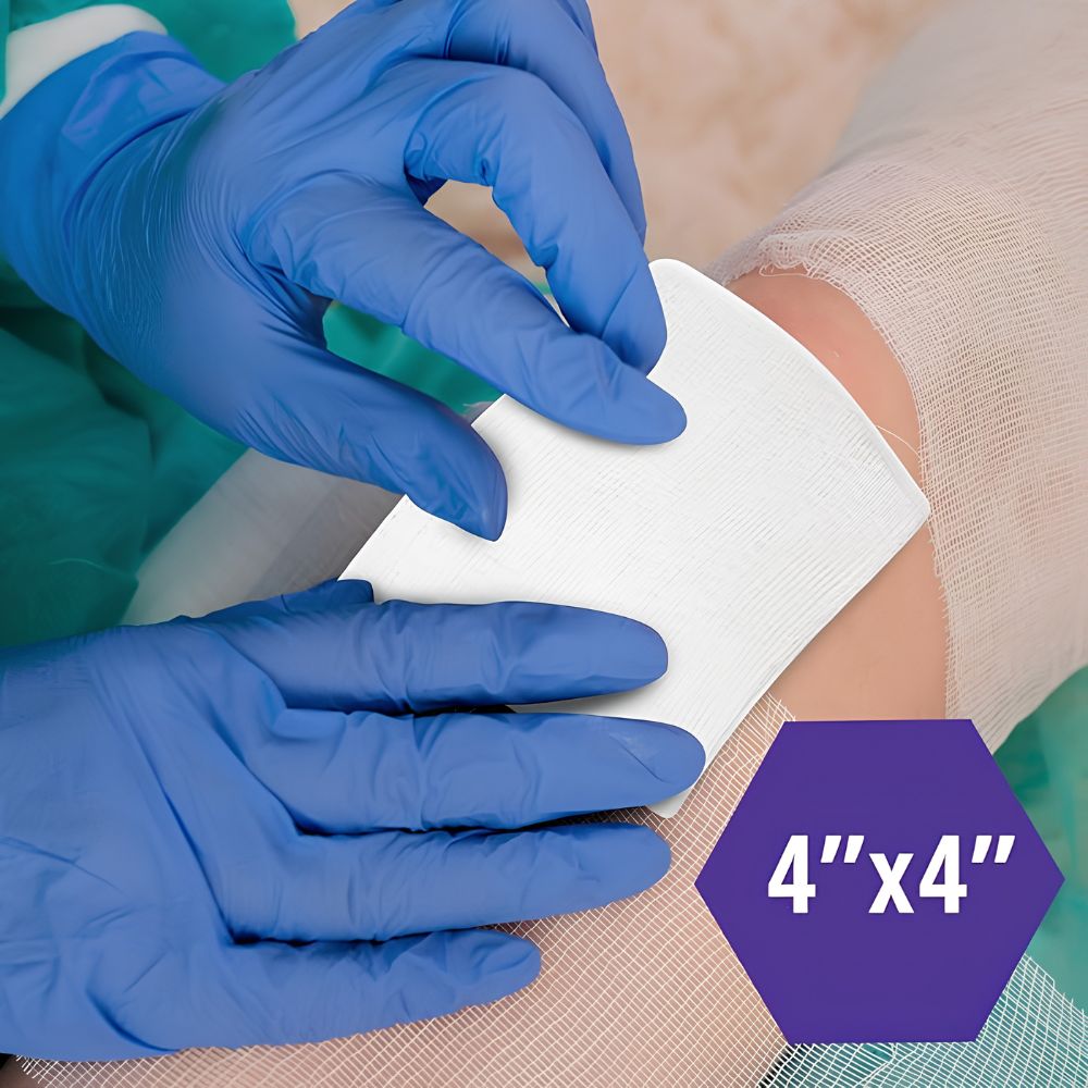 Gloved hands place a Shield Line Medpride All Gauze Surgical Sponge Non-Sterile, 4"x4" (12-ply & 16-ply), on a bandaged knee for wound care. A purple hexagon at the bottom right shows "4”x4”".