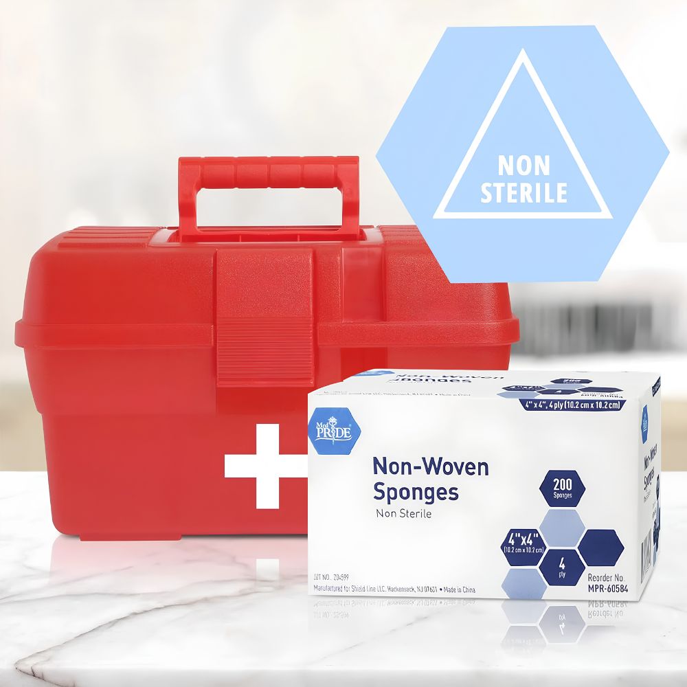 A red first aid kit with a white cross is next to a Shield Line MedPride Non-Woven Surgical Sponges box (2"x2", 3"x3", 4"x4" non-sterile). A blue triangle labeled "NON STERILE" is above the box; the light background is blurred.