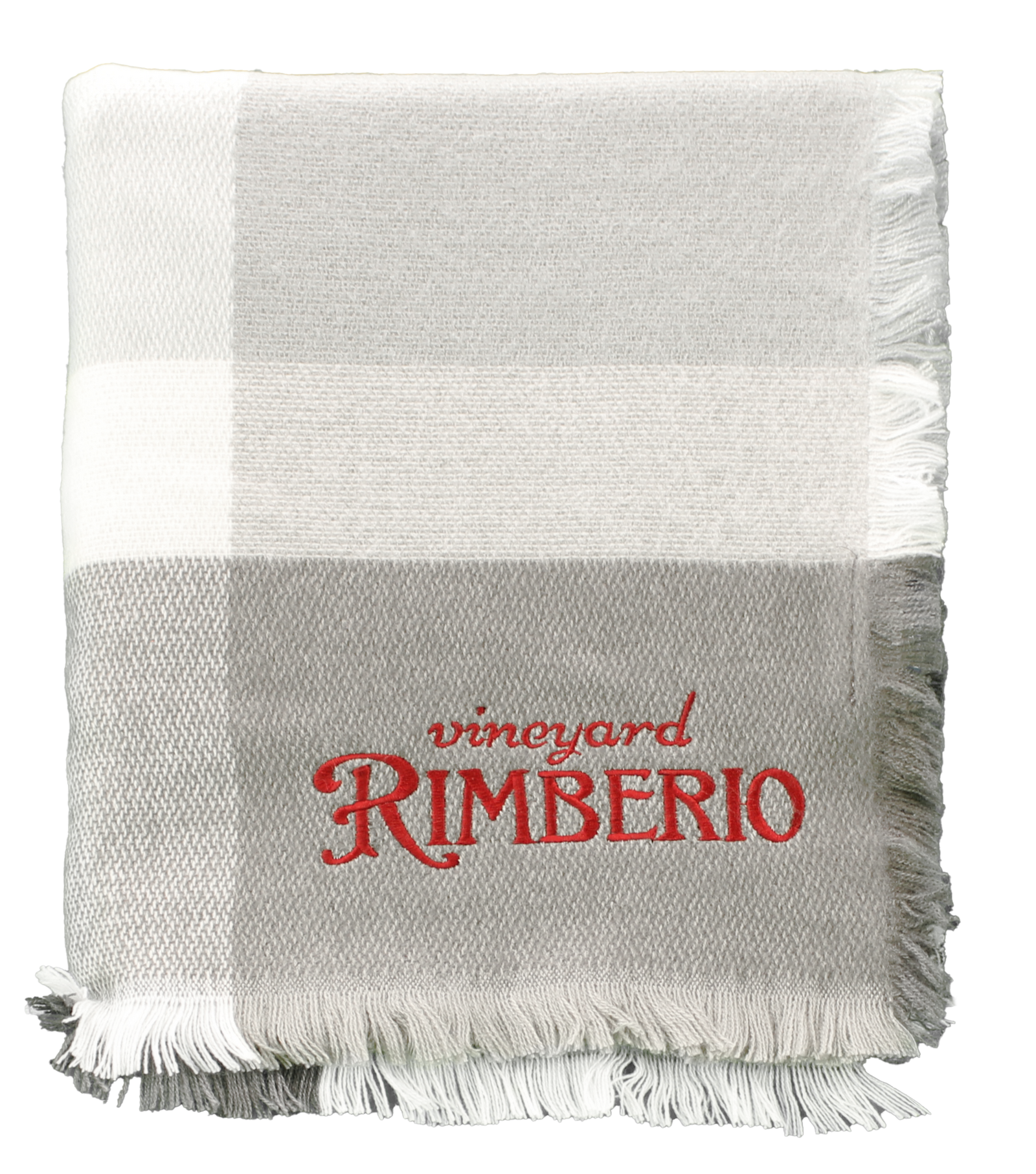 A soft, folded Canyon Comfort Throw by Pro Towels in cream, white, and gray plaid with fringed edges. "Vineyard RIMBERIO" is custom embroidered in red on the lower section of this cozy blanket.