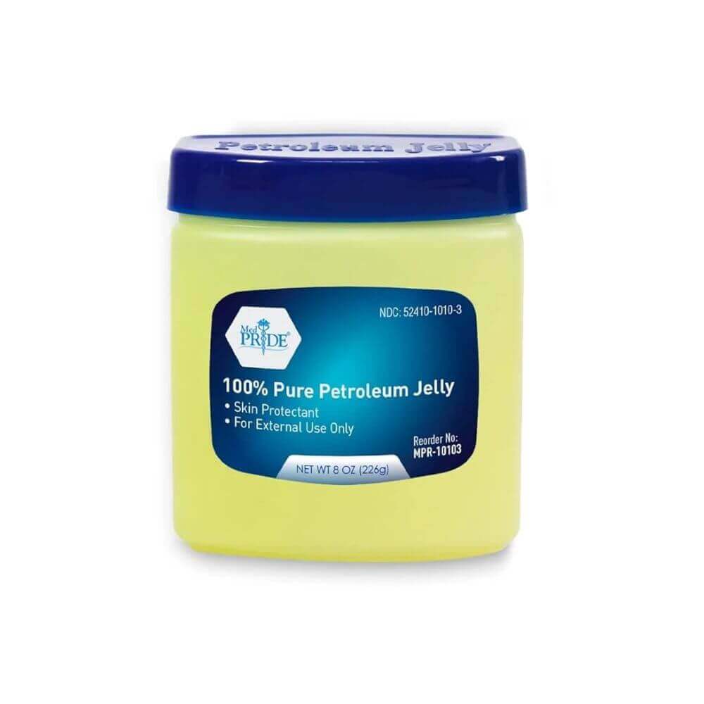A square container with a blue lid labeled Shield Line Petroleum Jelly in white and blue text. This 8 oz (226g) skin protectant moisturizes dry skin and is for external use only.