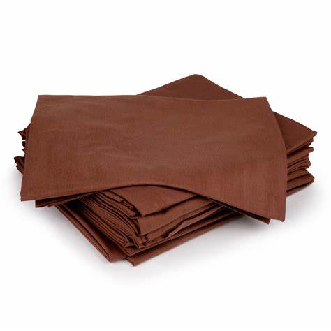 A neatly folded stack of brown cloth napkins is shown against a white background, with one partially unfolded on top—an ideal accent for KSEs Global Collection T-180 Fitted Colored Sheets in any hospitality environment.