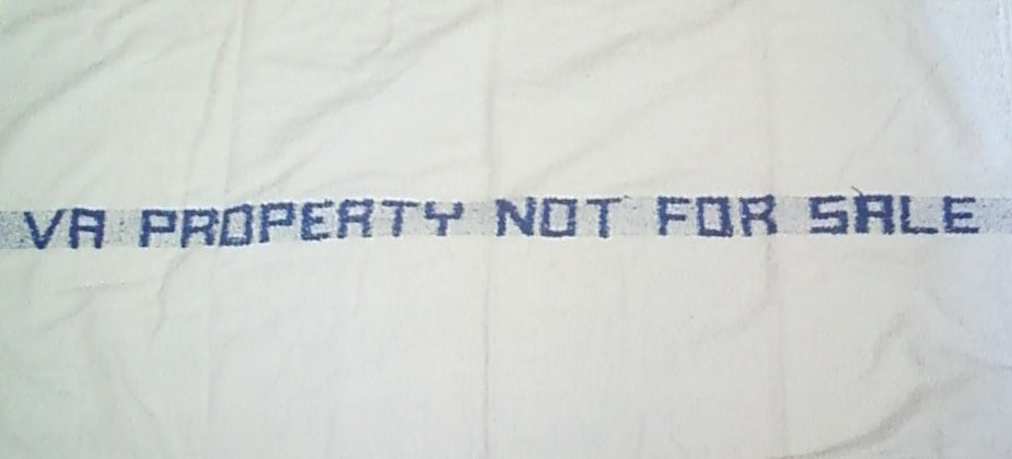 The KSE VA Property Towel is a white cloth featuring the text "VA PROPERTY NOT FOR SALE" in slightly faded blue letters, reminiscent of hospital towels.