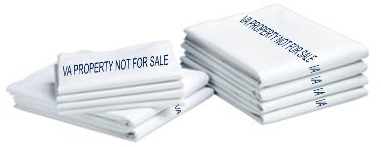 A stack of KSE Hospital Property Flat Sheets featuring VA PROPERTY NOT FOR SALE in blue text, indicating government ownership.
