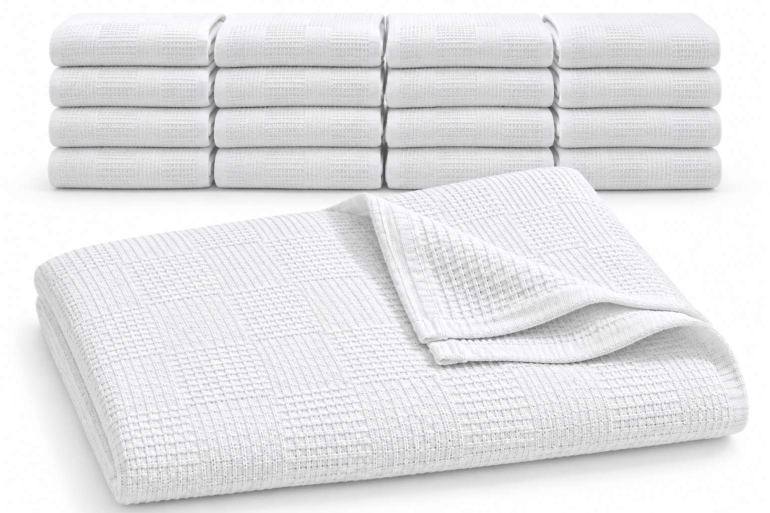 A stack of twelve folded KSE Snag Free Thermal Blankets in white 100% cotton sits behind one unfolded blanket, featuring a textured, snag-free waffle-weave pattern.