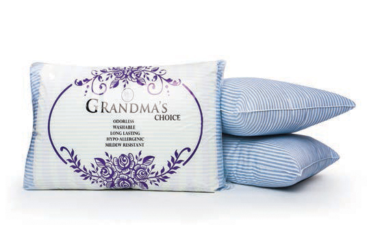 Three pillows are shown: one cozy Adored Granny Pillow by A+ Pillows with packaging displaying features, and two blue-and-white striped pillows stacked behind it.