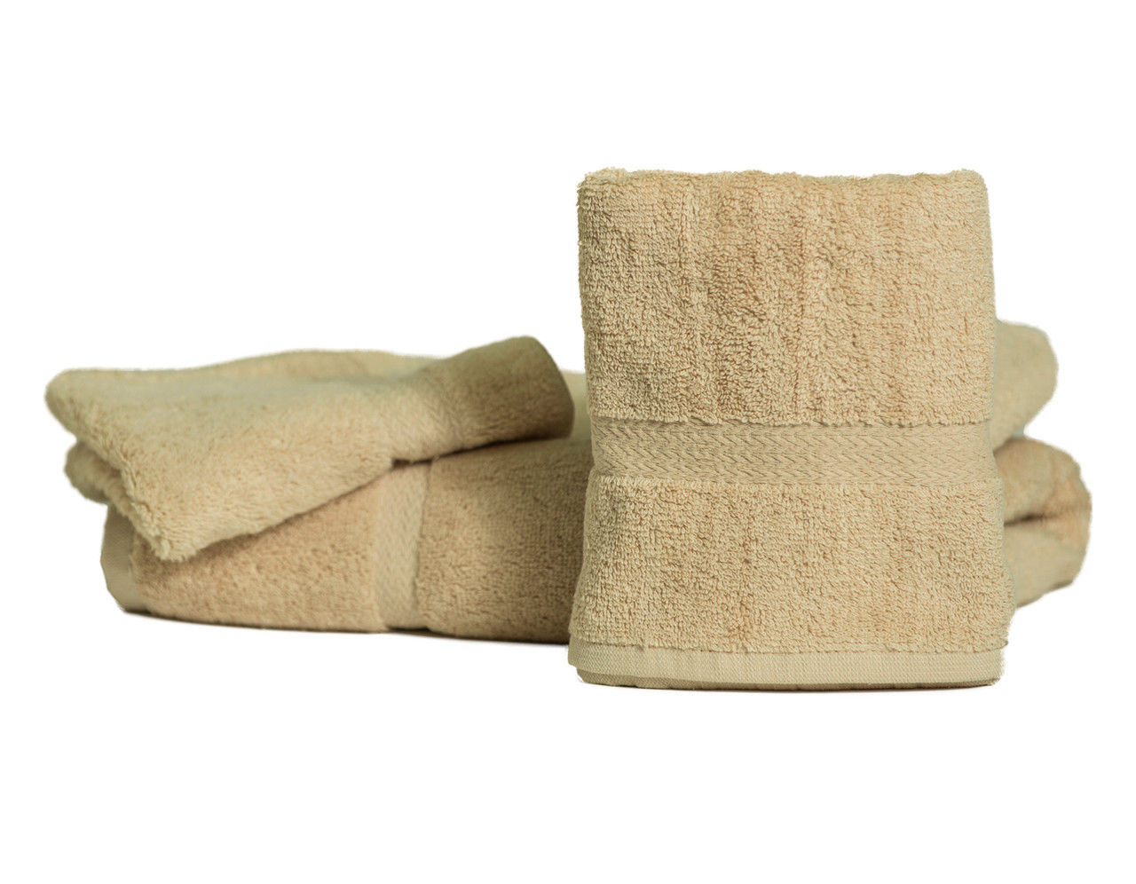 Two Royal Suite Beige Dobby Towels by Thomaston Mills, crafted from 100% cotton, are stacked on a white background—one upright and one flat.