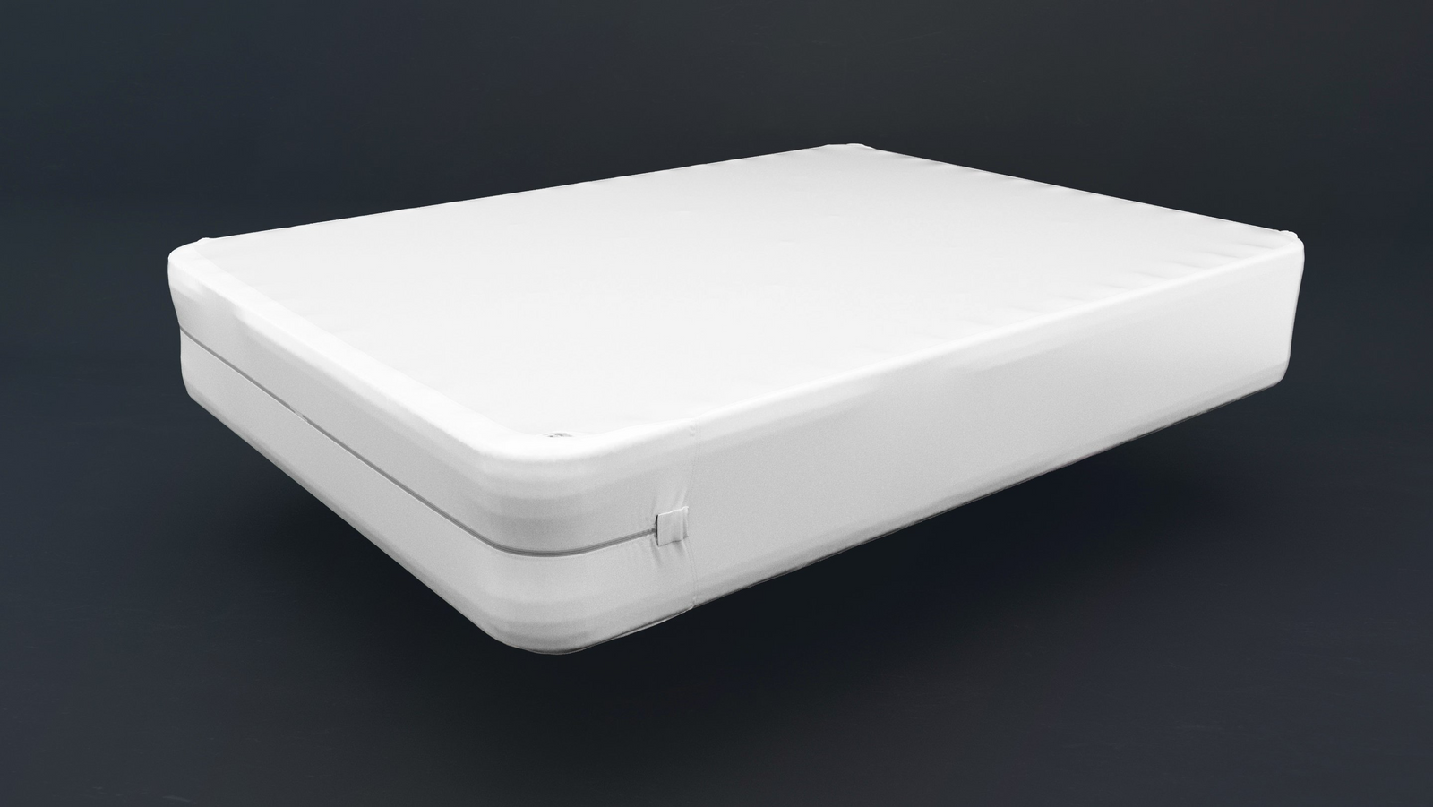 A white mattress with smooth edges and minimal detailing is shown on a dark background, highlighting its thickness—ideal for pairing with the WestPoint Home Matrex Green Mattress Pad for added comfort and protection.