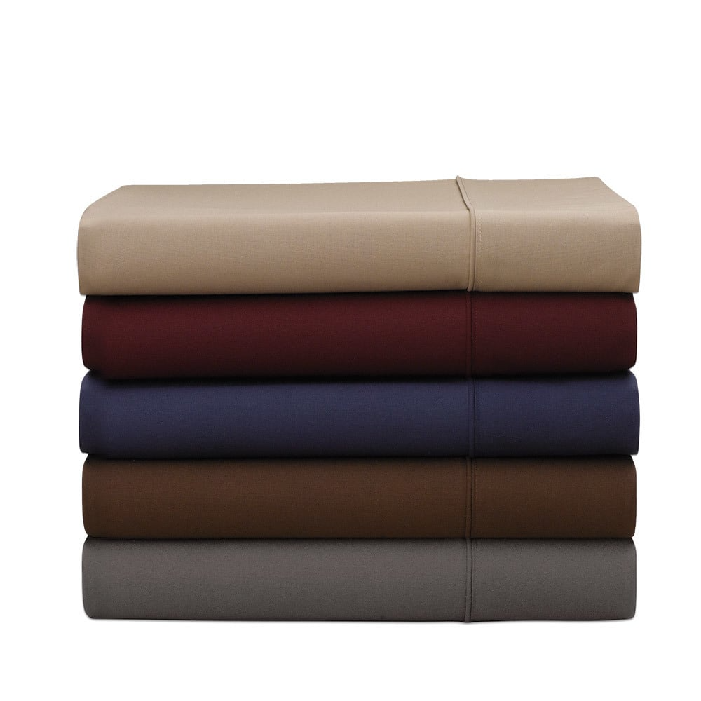 A set of five Martex Colors 200 Pillow Cases by WestPoint Home in beige, burgundy, navy blue, brown, and gray are stacked neatly against a white background.