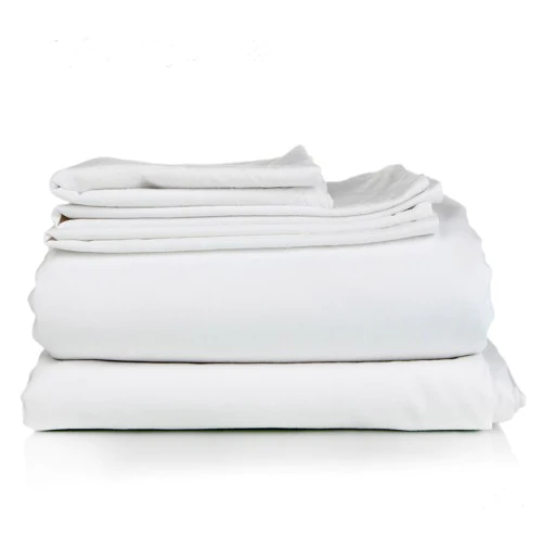 A neatly folded stack of Ganesh Mills Oxford Baby Crib Sheets with a 4" pocket is arranged on a plain white background.